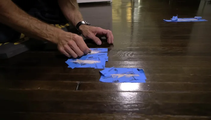 Carefully sand the edges to feather the repair into the existing wood finish, preventing harsh lines. Use 120-grit sandpaper for a smoother finish.