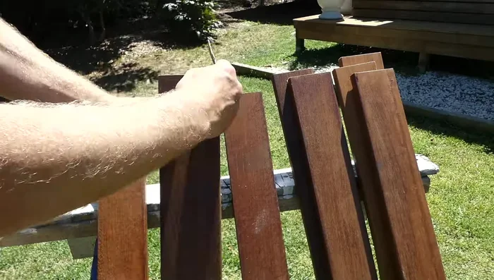 Cut and place the remaining decking boards, using timber wedges to maintain even spacing.