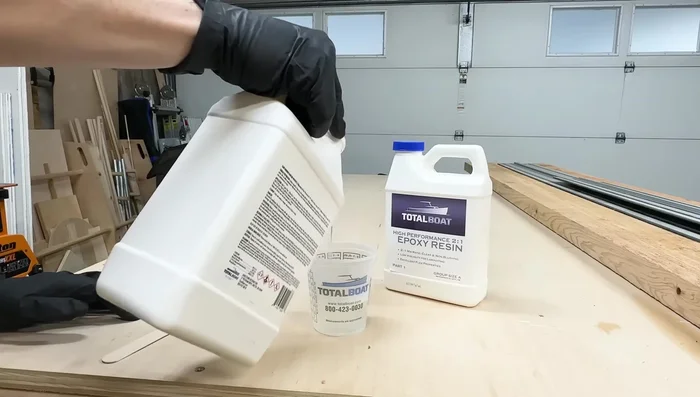 Square up 2x4s for the table base using a table saw.