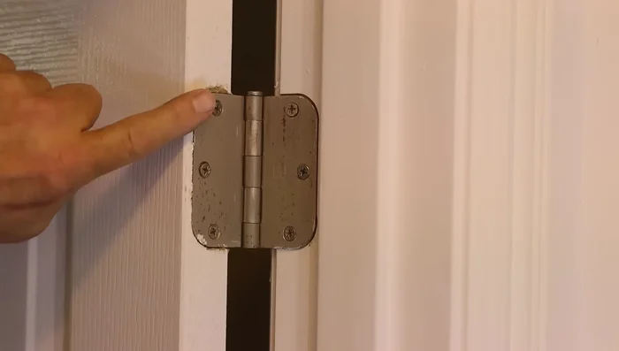 Check all hinges: Ensure all screws on all hinges are tight and flush.