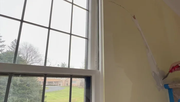 Apply Mesh: Embed mesh into the pre-filled crack, ensuring it's closer to the surface. Let it dry.