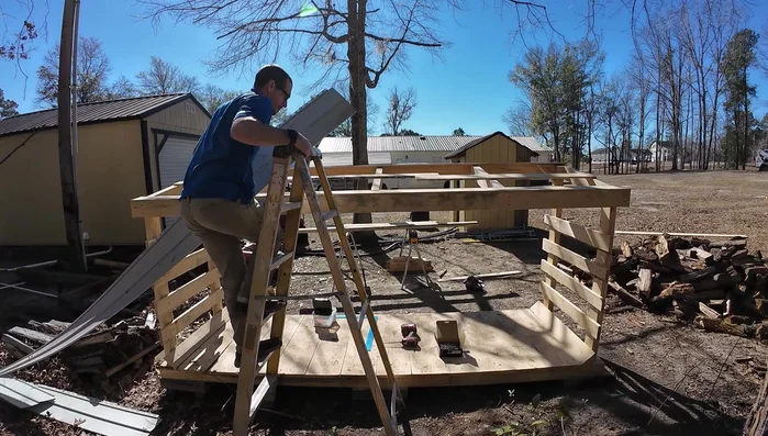 Add roof slats and covering (e.g., vinyl siding).