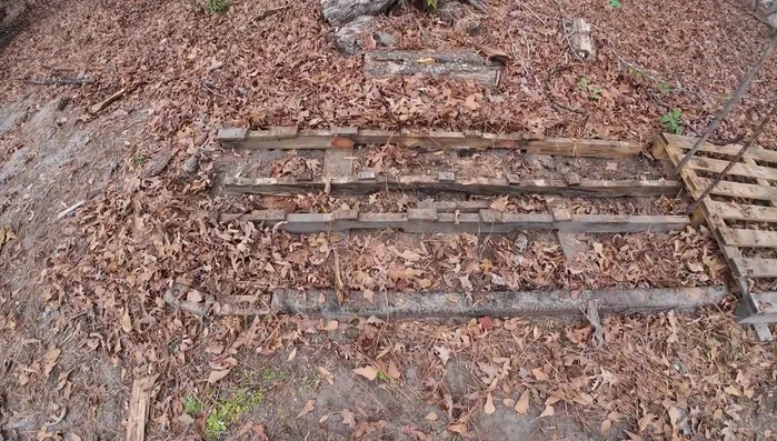 Clear the area and move existing firewood.