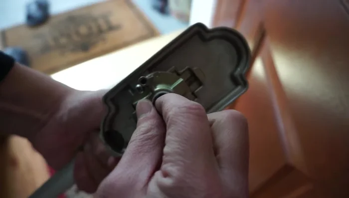 Tighten all screws and test the functionality of the entire assembly. Ensure the door locks and unlocks correctly.