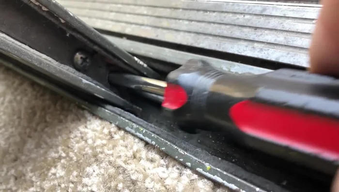 Adjust the wheels using the adjustment screw, raising or lowering as needed to ensure even spacing.