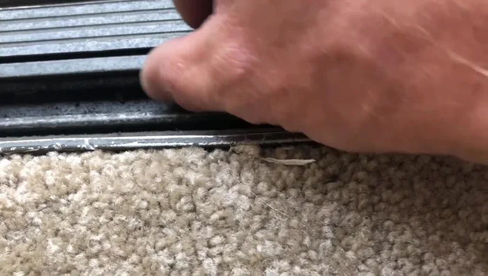 Apply silicone spray to the friction points on the door and track to improve sliding.