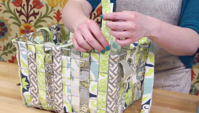 Glue the ends together, fold under, and glue down, pulling fabric tight.