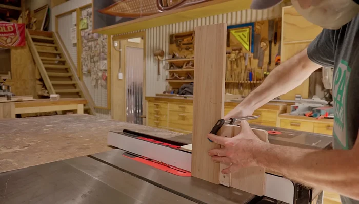 Cut grooves in both sides of each joint to create a spline joint. This strengthens the cabinet.