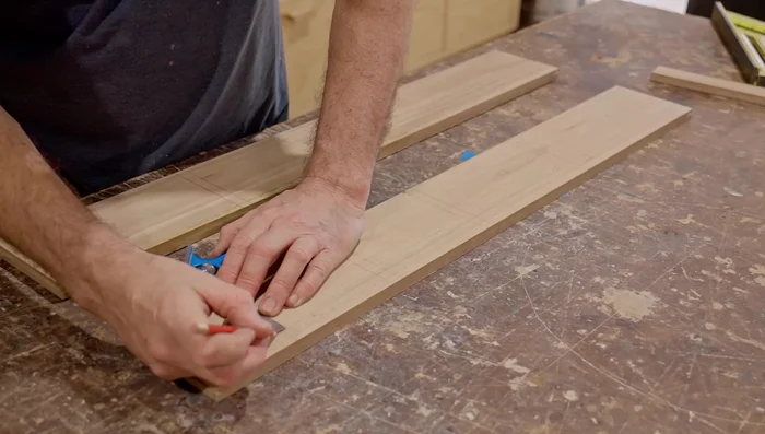 Cut rebates on both sides of the cabinet for panels (back and door).