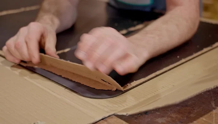 Cut grooves in both sides of each joint to create a spline joint. This strengthens the cabinet.