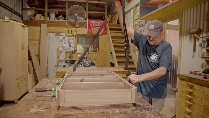 Shape the outside corners using an orbital sander.