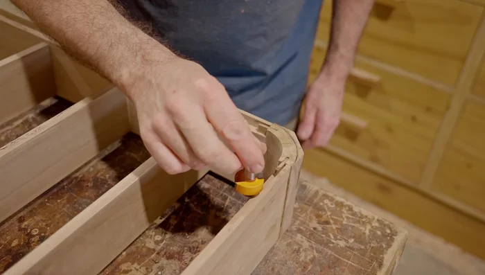 Shape the outside corners using an orbital sander.