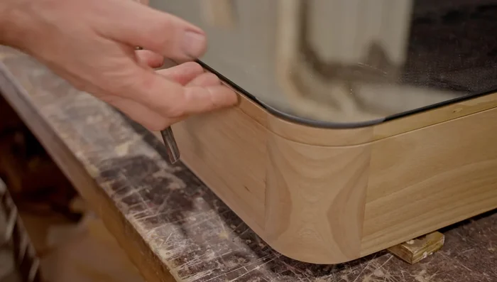 Attach hinges to the door and cabinet.