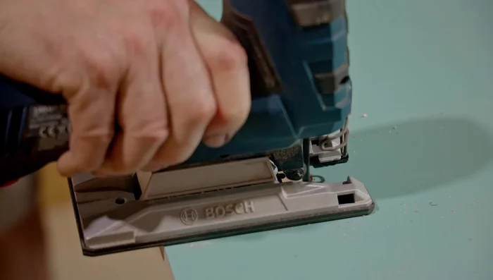 Glue the back panel into the cabinet.