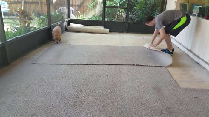 Clean the concrete surface thoroughly with a pressure washer and allow it to dry completely.