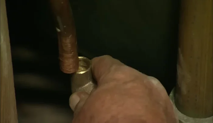 Connect the T-fittings to the pipes using solder.