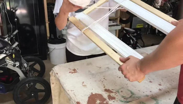 Add the bottom shelf: Attach the bottom shelf to the legs using screws.