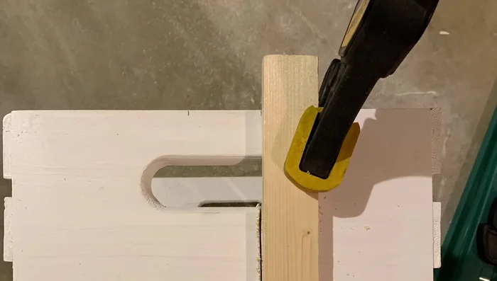 Attach keyhole hangers: Add four keyhole hangers (one on each side) for wall mounting.