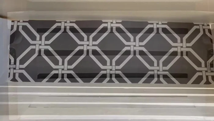 Prepare placemats: Cut down placemats to prevent books from falling through the crate slats.