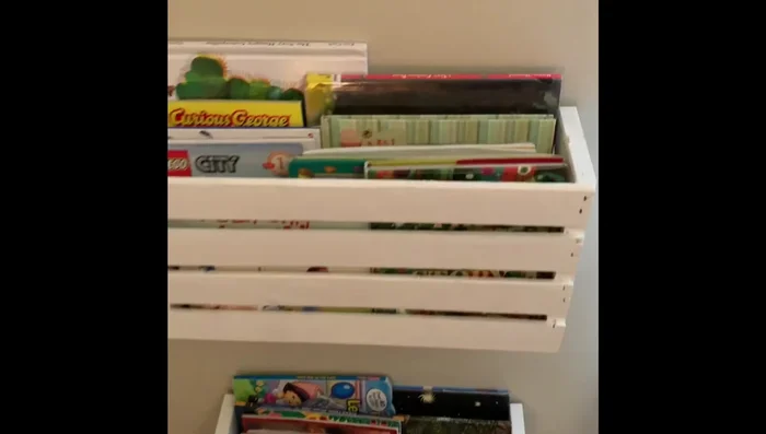 Install the shelves: Securely mount the bookshelf to the wall using drywall anchors.