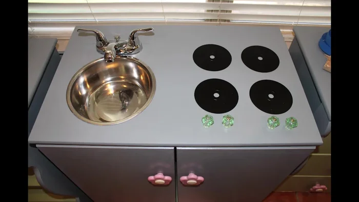 Add glass knobs as burner knobs.