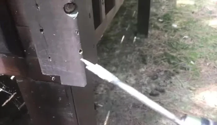 For corner posts, use a spade bit to create a pocket for the washer to sit in at the angled surface.