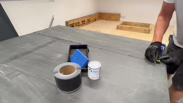 Use seam tape offcuts to temporarily bond the upper rubber.