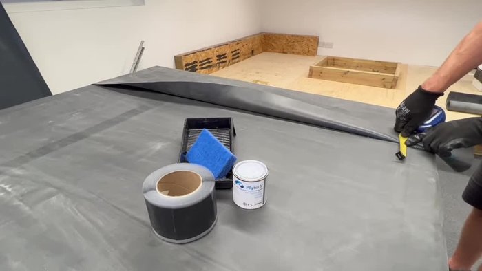 Use seam tape offcuts to temporarily bond the upper rubber.