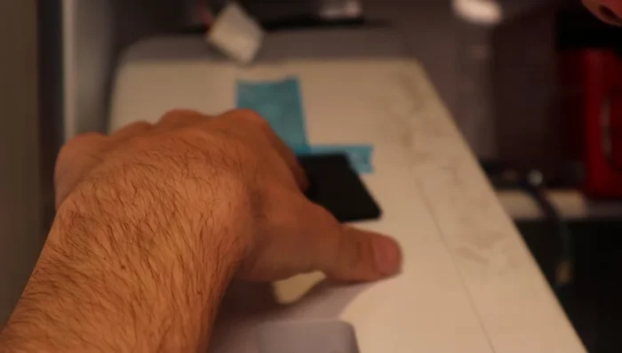 Reinstall the ice tray, securing it with bolts and tracks.