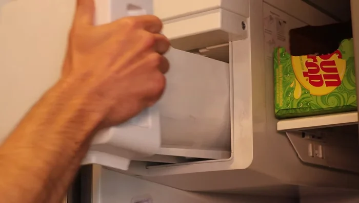 Remove the front plastic tray.