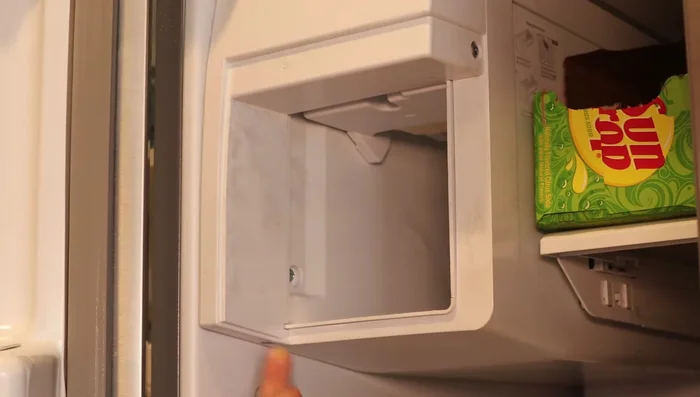 Remove the front plastic tray.