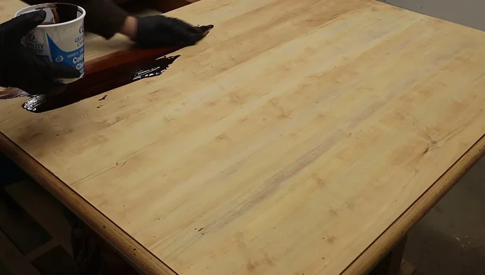 Apply a sealer coat and allow it to dry. Sand lightly.