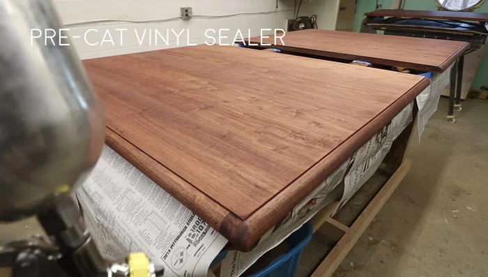 Apply a toner coat (optional) to even out the color, followed by a top coat.