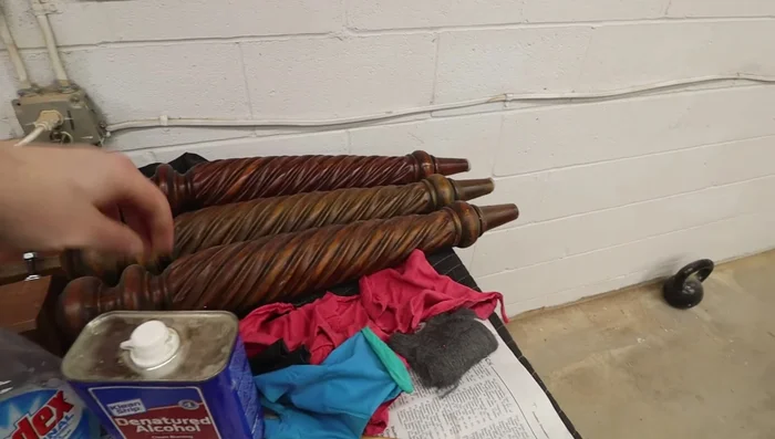 Clean and touch up the table legs using diluted Windex (50/50), steel wool, and an air hose to remove grime.