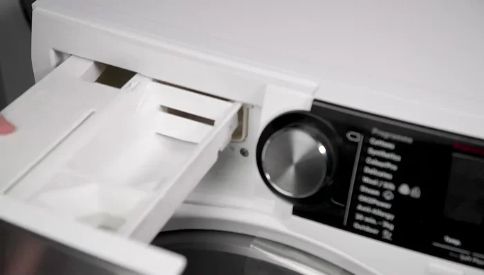 Once clean and dry, return the dispenser drawer to its housing.