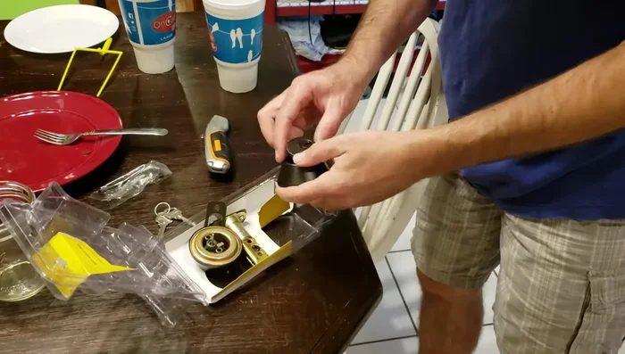 Adjust the length of the deadbolt as needed to fit your door.