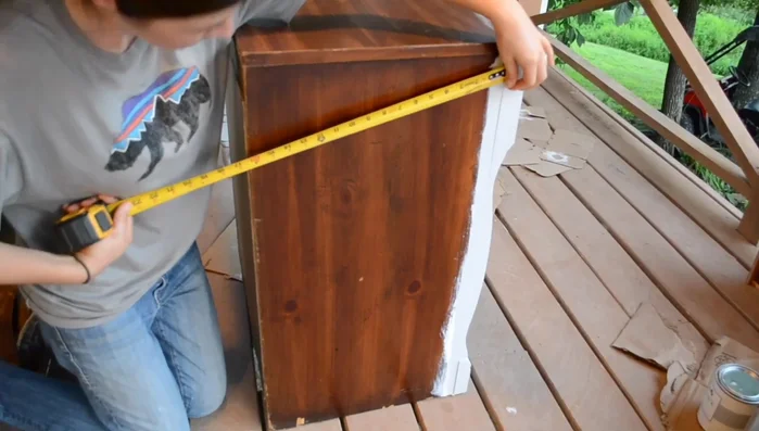 Secure the B board to the desk using a finishing nail gun.