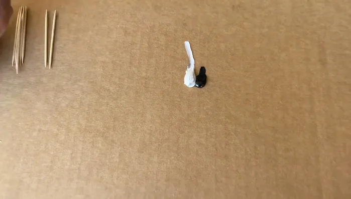 Mix equal parts of JB Weld epoxy and apply it to the cracks using a toothpick. Work the JB Weld into the cracks and remove excess material.