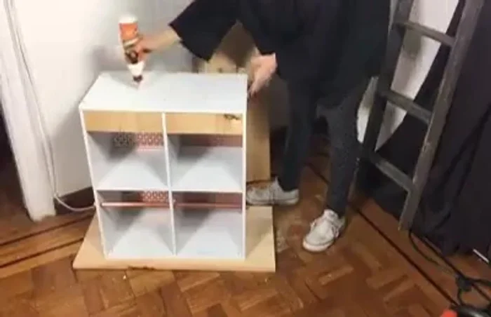 Attach the bottom wood slab, screwing from the bottom up through the slab and into the shelf. Use wood glue for extra security.