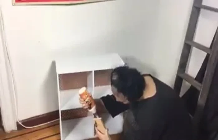 Attach small pieces of wood to the front of the lower shelves to create lips for smaller items.