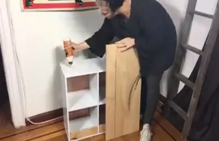 Insert copper pipes through the holes, leaving half an inch exposed on each side. Cap the ends.