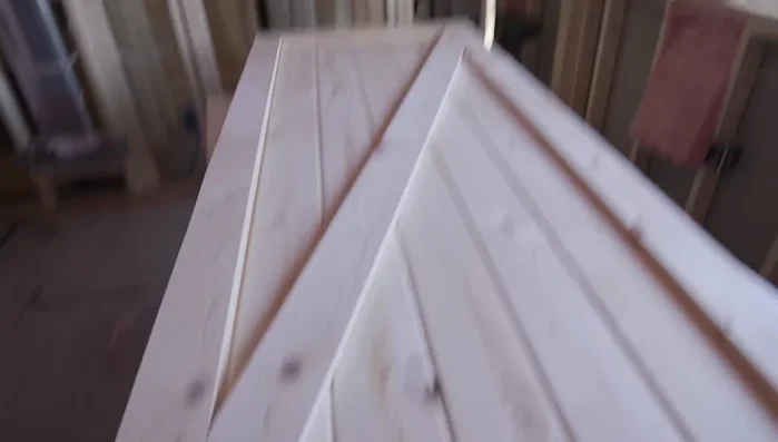 Add cross-bracing: Lay framing boards across door and mark cuts for diagonal bracing. Cut with a skill saw. Gaps do not need to be perfectly precise.