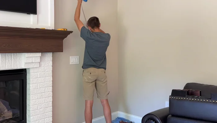 Fish the wire from the outlet box to the fixture box.