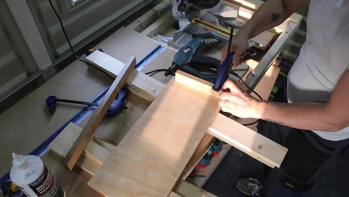 Assemble the shelves using wood glue and brad nails. Glue the sides first, then the back. Use clamps to hold the pieces together while securing with nails.