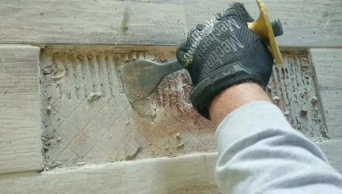 Clean out the old mortar and grout completely, ensuring a flat and smooth surface for the new tile. Pay close attention to the edges and corners.