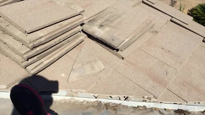 Identify the leak. Locate the source of the leak; in this case, a broken tile was found next to a valley.