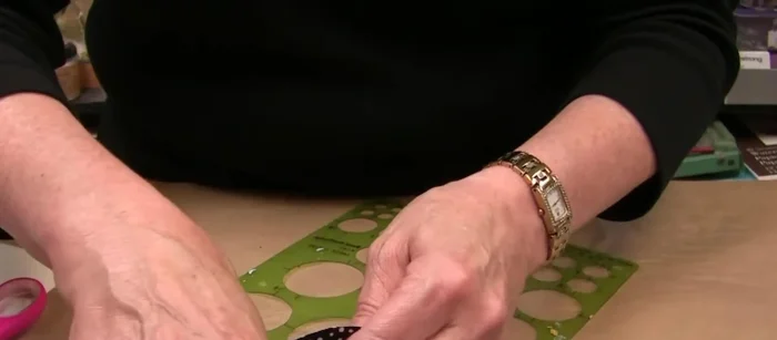 Attach the eyelets to the buckle using the eyelet setter.