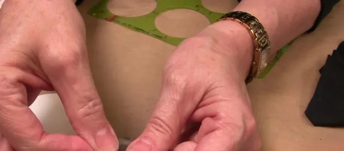 Attach the eyelets to the buckle using the eyelet setter.