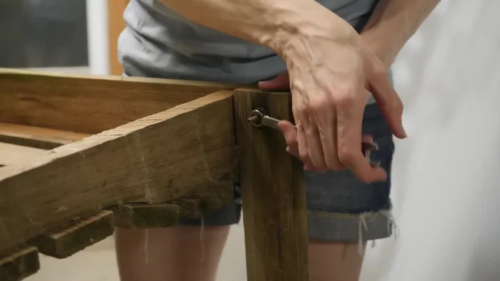 Clean the swing and remove old hardware.