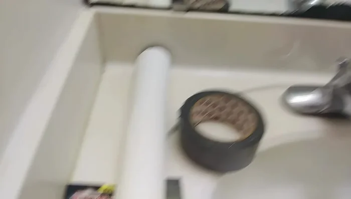 Apply Cold Fiber Fix Extreme glue to the back of the plastic trim.